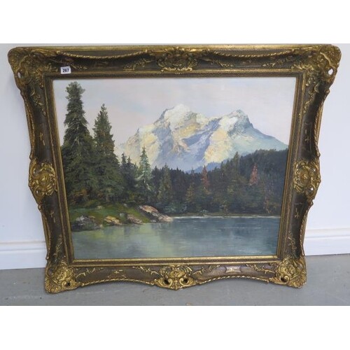 An oil on canvas Swiss Alpine scene with lake to foreground,...