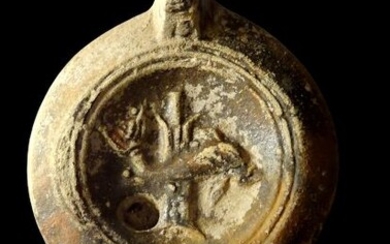 Ancient Roman Ceramic Oil lamp with dolphin decor - potter's mark M.NOVIST