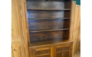 Arts and Crafts oak dresser with shelves above and two cupbo...