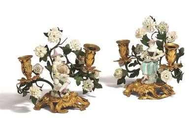 BRONZE AND PORCELAIN PAIR OF TWO-LIGHT CANDLESTICKS WITH COLUMBINE AND...