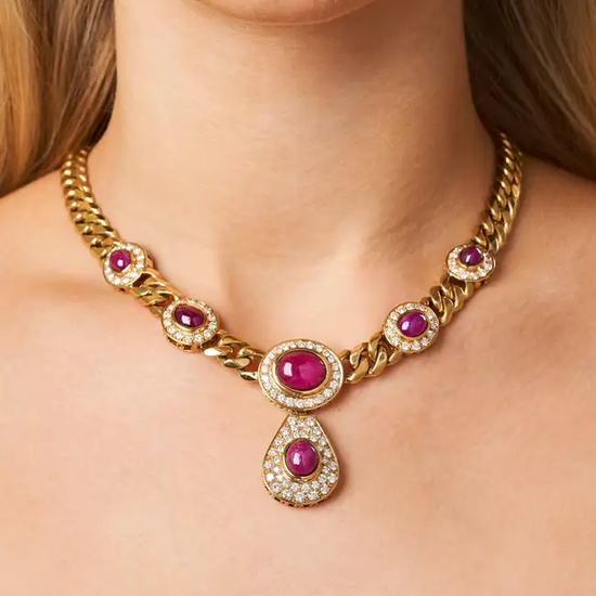 BULGARI, A RUBY AND DIAMOND NECKLACE comprising a ...