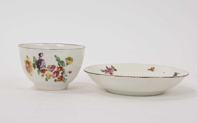 Derby ribbed tea bowl and saucer, painted with flowers, circa 1758