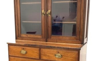 Early to mid 19th century walnut bookcase on chest,...