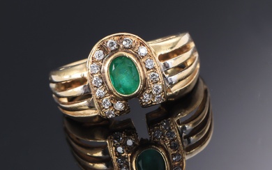 Emerald and brilliant ring in 14 kt. gold