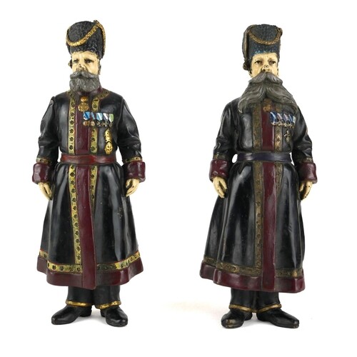 FABERGÉ, A PAIR OF COLD PAINTED BRONZE STATUES OF KOSAKS Be...