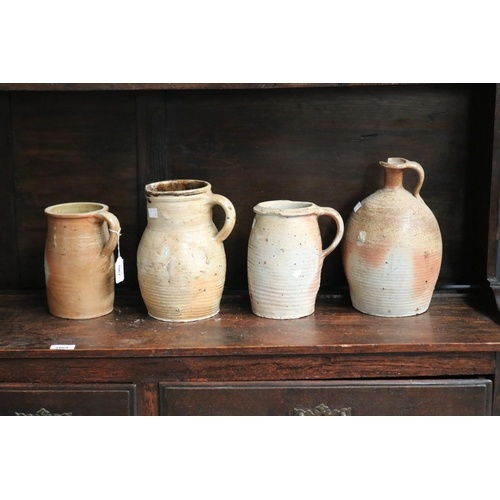 Four French stoneware jugs, approx 26cm H and shorter (4)