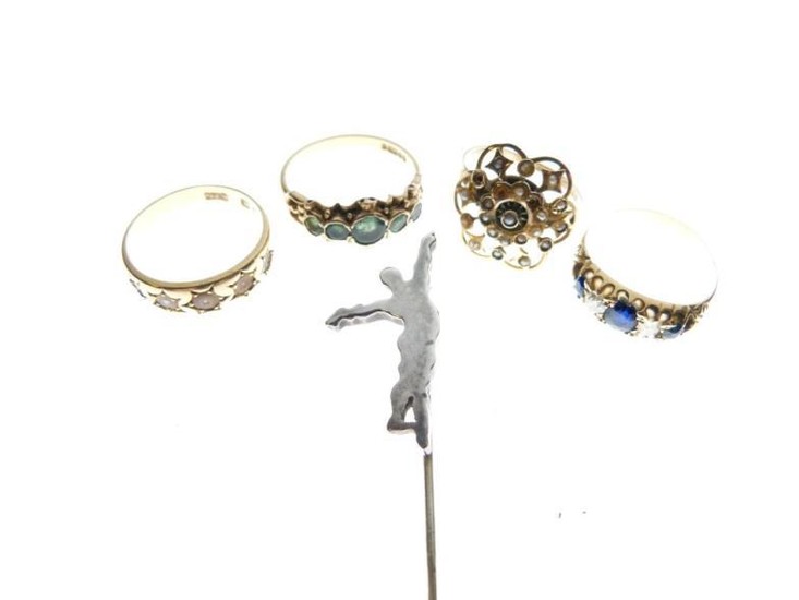 Four assorted gold and yellow metal rings comprising 18ct...