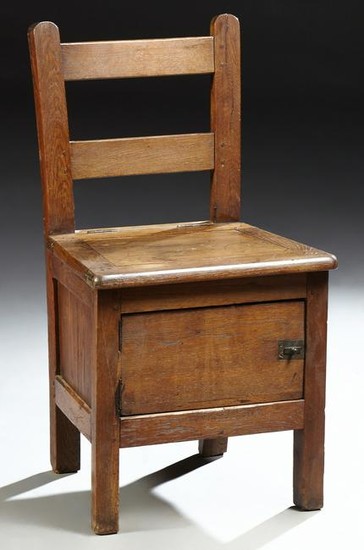 French Provincial Carved Oak Potty Chair, 19th c., the
