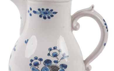 GERMAN TIN-GLAZED EARTHENWARE BLUE AND WHITE COFFEE POT AND COVER, CIRCA 1785 Height: 8 in. (20.3 cm.)