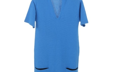 Hermès: A blue knit dress made of cashmere with short sleeves, v neck line and two pockets. Size 38.