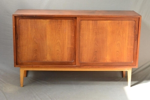 IN THE MANNER OF POUL HUNDEVAD, a 1960 s Danish style teak p...
