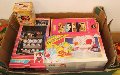 Lot details Three trays containing Sindy dolls related furniture and...