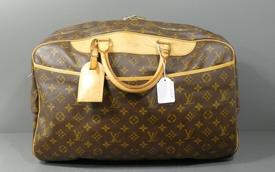 Louis Vuitton monogrammed canvas travel bag
