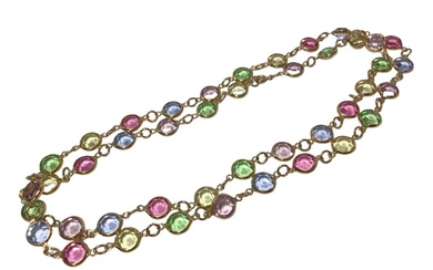 Multi-gem necklace with spectacle setting