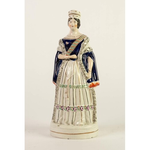 NINETEENTH CENTURY STAFFORDSHIRE POTTERY FIGURE OF QUEEN VIC...
