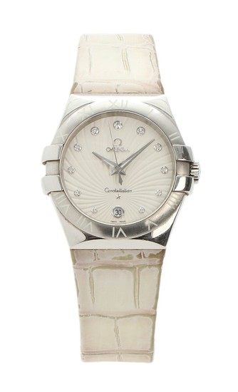 Omega: A lady's diamond wristwatch of steel. Model Constellation, ref. 12313356052001. Quartz movement with date. Case diam. 35 mm. 2013.