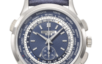 PATEK PHILIPPE. AN ATTRACTIVE 18K WHITE GOLD AUTOMATIC FLYBACK CHRONOGRAPH...