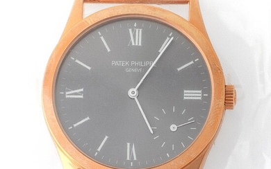 Patek Philippe. Limited Edition and Sophisticated Calatrava Wristwatch in Pink Gold, Reference 5026, With Grey Dial Made for the New Millennium and Extract from Archives