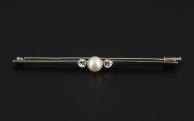 Platinum tie clip with 2 diamonds and pearl.