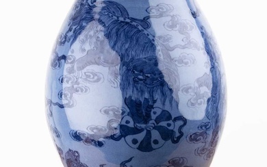 Powder blue bottle vase Chinese, 18th Century painted with Buddhist...