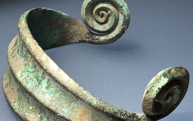 Prehistoric Late Bronze Age-Iron Age Bronze Exquisite Superb Bracelet with two Spiral Terminals.Upper part shaped as a ''smoothly flowing wave''