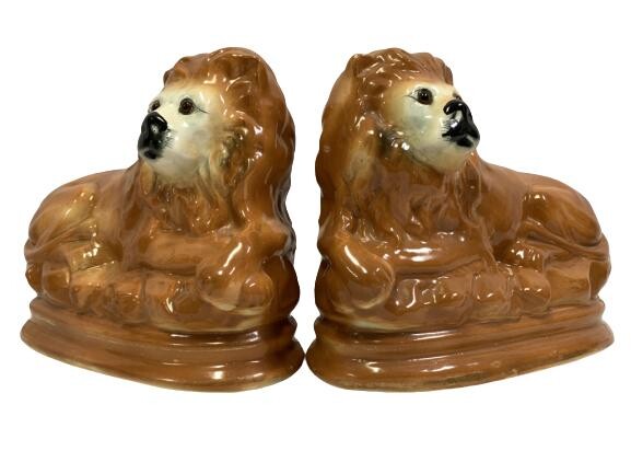 RARE PAIR OF GLAZED POTTERY LION FIGURES 8.5"