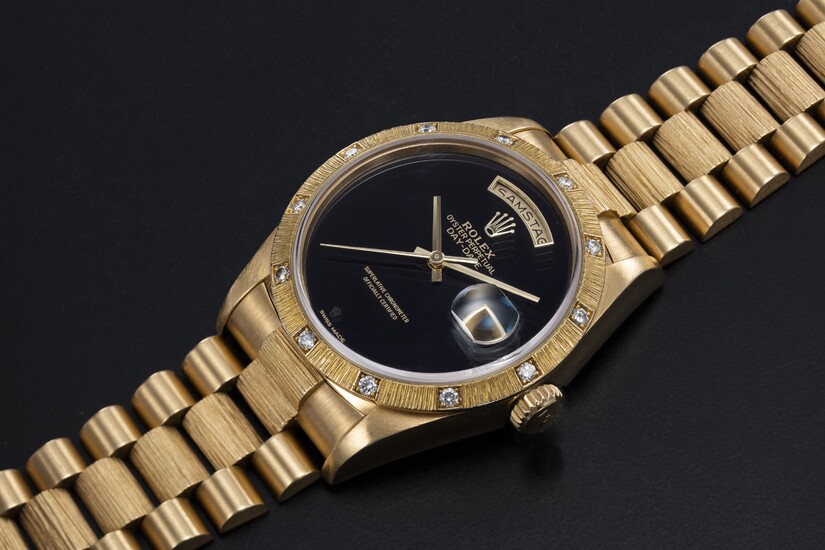 ROLEX, A GOLD OYSTER PERPETUAL DAY-DATE WITH DIAMOND BEZEL AND ONYX DIAL, REF. 18108