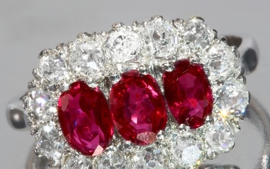 RUBY AND DIAMOND TRIPLE CLUSTER RING, 18 ct. gold and platin...