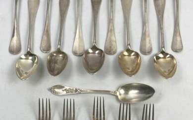 Several silver household items, including