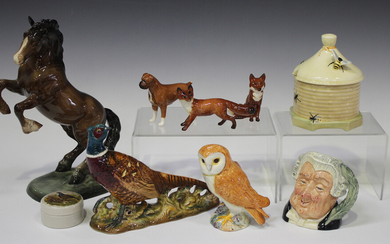 Six Beswick animals, comprising Pheasant, No. 1226, Rearing Welsh Cob, No. 1014, Barn Owl, No. 2026