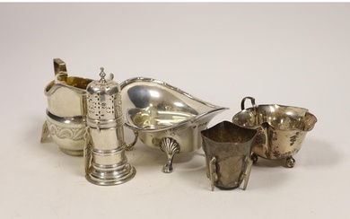 Small silverware, consisting:- a late Victorian helmet shape...