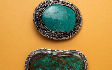TWO STERLING SILVER AND TURQUOISE BELT BUCKLES.