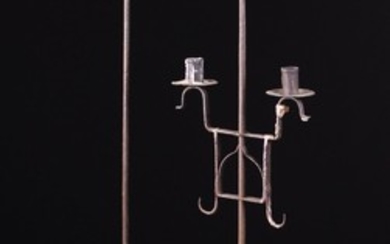 Two Similar Wrought Iron Floor Standard twin-socket Candle Holders; one 18th century, the other late