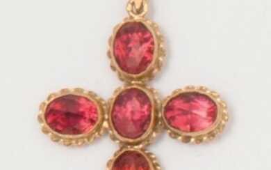 Yellow gold "Cross" pendant set with faceted garnets. Romantic period work. Dimensions : 4 x 2,8cm. Weight : 4,6g.