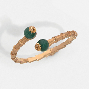 ZOLOTAS "BAMBOO" BRACELET A jade and gold bracelet....