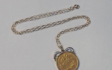 1897 HALF SOVEREIGN IN 9CT GOLD PENDANT MOUNT ON 9K GOLD CHA...