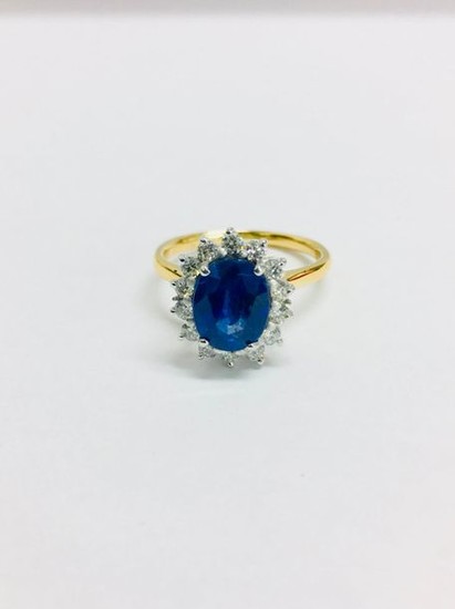 18ct Sapphire and diamnd cluster ring,9mmx7mm approximately 2.50ct...