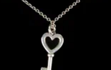 Heart-shaped key pendant in sterling silver by Tiffany & Co.