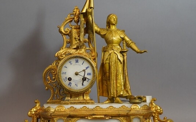 268- Pendule en bronze doré et marbre représentant Jeanne d'Arc (accidents au marbre et à...