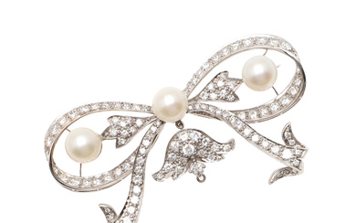 3314768. A DIAMOND AND CULTURED PEARL BOW BROOCH.