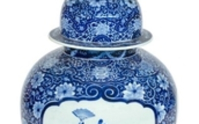 BLUE AND WHITE ARITA PORCELAIN TEMPLE JAR In inverted pear shape, with domed cover and onion finial. Body decorated with cartouches...
