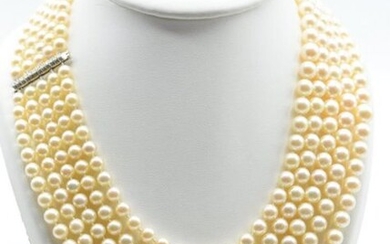 5-row pearl necklace with 18 ct white gold clasp set with 12 brilliants +/- 0.40 ct (46 cm) + 2 additional pearls