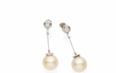 A pair of cultured pearl and diamond drop earrings