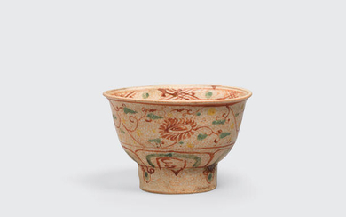A tall footed bowl with polychrome enamel decoration
