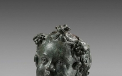 Art gallo-romain, vers le IIe siècle Peson représentant le dieu Bacchus enfant