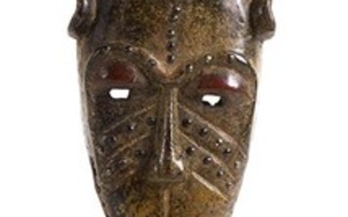 A BAULE WOODEN MASK FROM IVORY COAST 40 cm high...