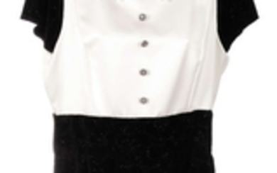 CHANEL - a cream satin and black velvet Camellia dress.