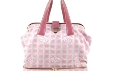 CHANEL - a pink logo Travel Line Gladstone handbag.