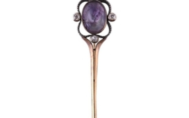 An early 20th century amethyst and diamond cameo stick pin brooch