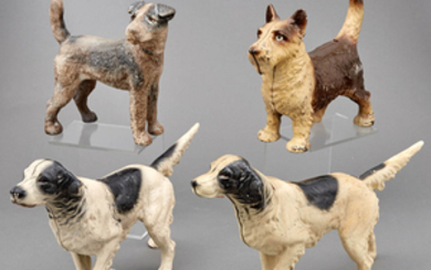 Four Painted Reproduction Cast Iron Dog Doorstops